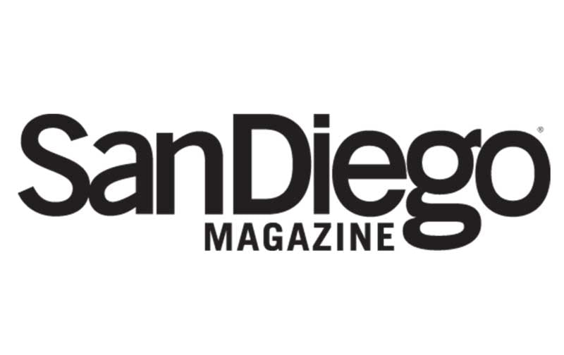 Logo of San Diego Magazine that links to an article written by them about Seven Seas Roasting Co.