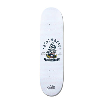 bottom of white skateboard deck with seven seas logo large in the middle in collaboration with OSBT clothing