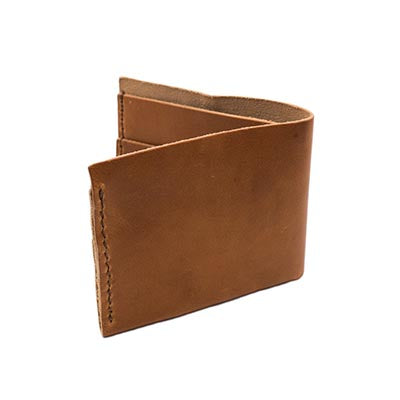 back of Brown leather wallet with seven seas logo branded on front of wallet